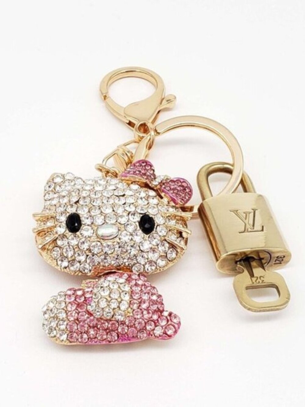 Louis Vuitton Gold Lock 🔒 Authentic LV Key + Unbranded Hello Kitty Bag Charm - Picture 4 of 8
